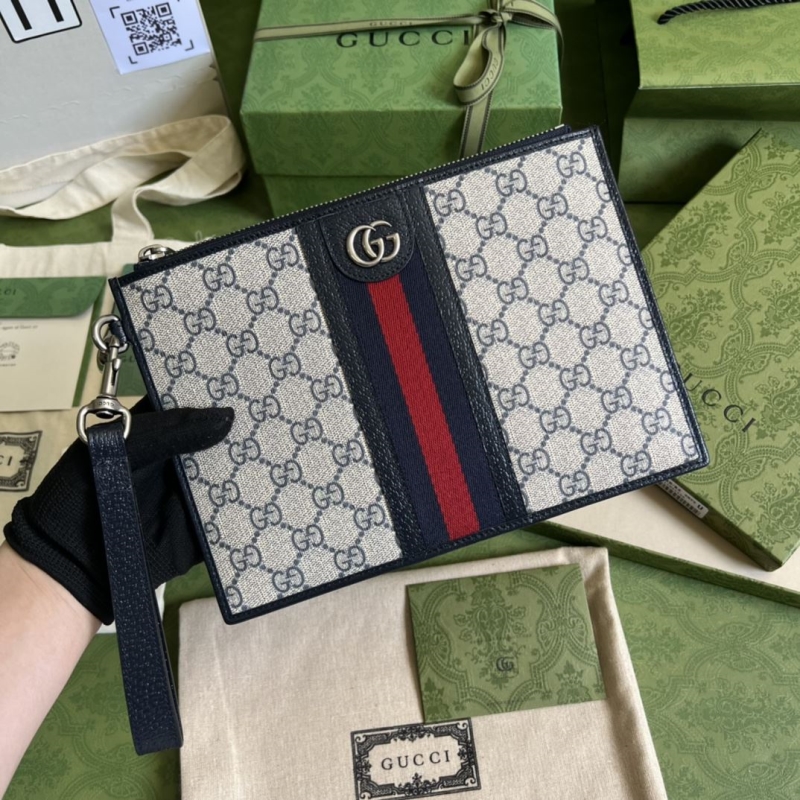 G*u*i clutch bags